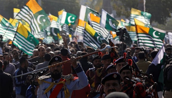 Members of a Police band lead a march to mark Kashmir Solidarity Day at the mausoleum of Muhammad Ali Jinnah, in Karachi. — Reuters