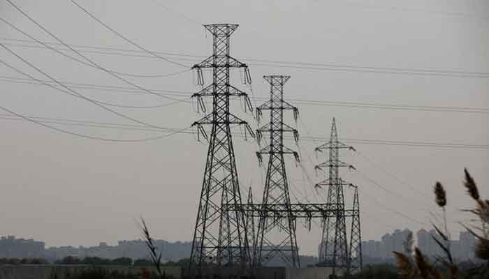 A power transmission tower in Karachi, Pakistan, January 24, 2023. — Reuters