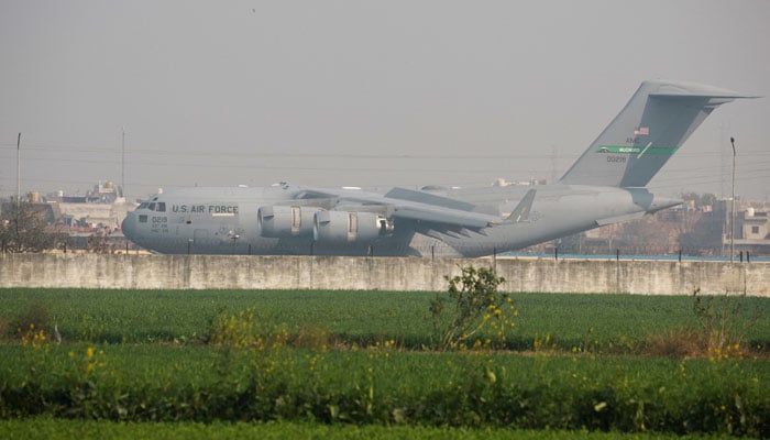 A US military plane deporting Indian immigrants lands in Amritsar, India February 5, 2025. — Reuters