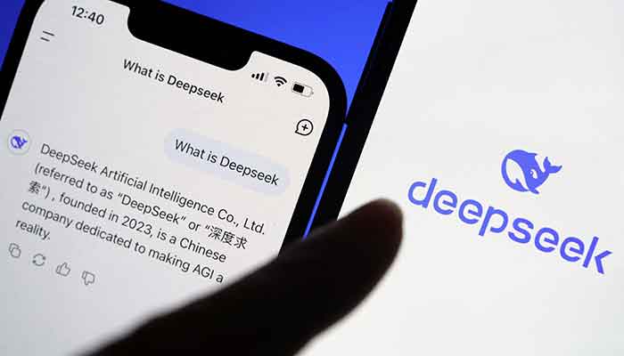 The logo of DeepSeek is displayed alongside its AI assistant app on a mobile phone, in this illustration picture taken on January 28, 2025. — Reuters