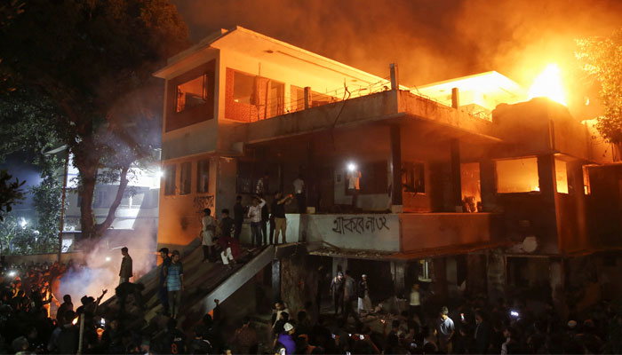 Protesters use an excavator to demolish the Dhanmondi-32 residence of Bangabandhu Sheikh Mujibur Rahman, father of the ousted PM Sheikh Hasina, in Dhaka, Bangladesh February 5, 2025. — Reuters