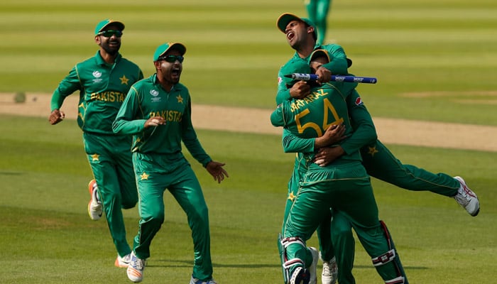 Pakistans Sarfraz Ahmed and teammates celebrate winning the ICC Champions Trophy at The Oval, on June 18, 2017. — Reuters