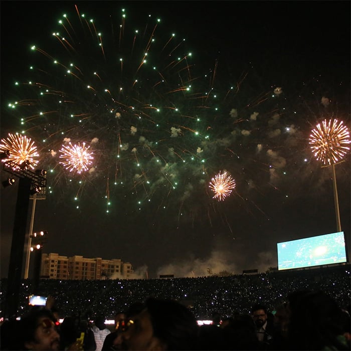 Spectators watch fireworks during inauguration ceremony of renovated Gaddafi Stadium Lahore on February 7, 2025. — PCB