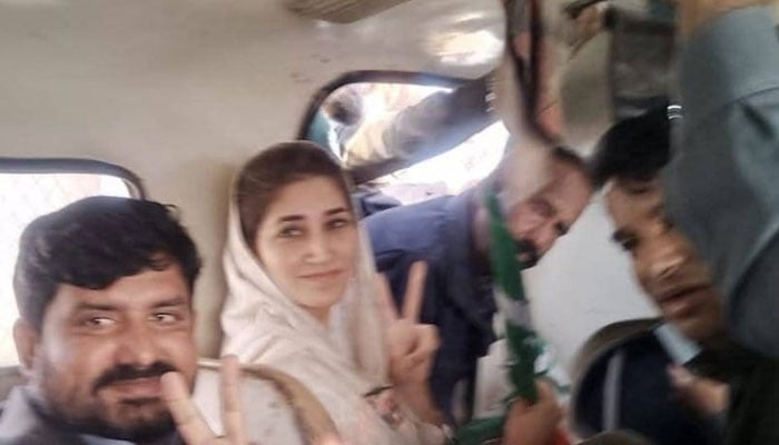 PTI leader Meher Bano Qureshi shows victory sign as she is taken into custody by police for violating Section 144 on February 8, 2025. — X@BakhtawarGillni