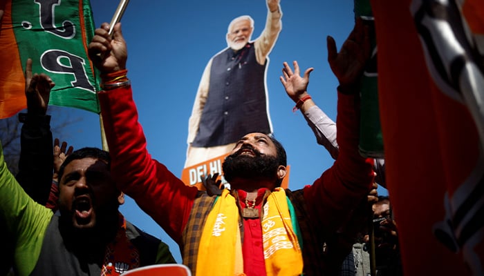 Bharatiya Janata Party (BJP) supporters celebrate outside the BJP state headquarters, as BJP is projected leading in the election results in the Delhi state, in New Delhi, India, February 8, 2025. — Reuters