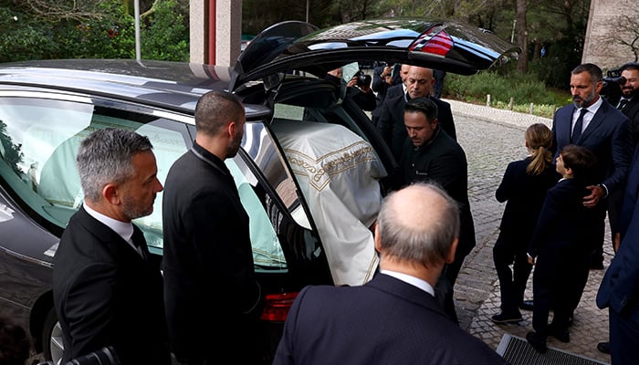 A coffin of Prince Karim Al-Hussaini Aga Khan IV, the spiritual leader of Ismaili Muslims, is carried into the hearse from the Ismaili Centre during his funeral in Lisbon, Portugal, February 8, 2025. — Reuters