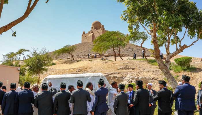 Prince Karim al-Hussaini Aga Khans casket being carried by hand to hilltop mausoleum of Mawlana Sultan Mahomed Shah in Aswa, Egypt, February 9, 2025. — Facebook/theismaili