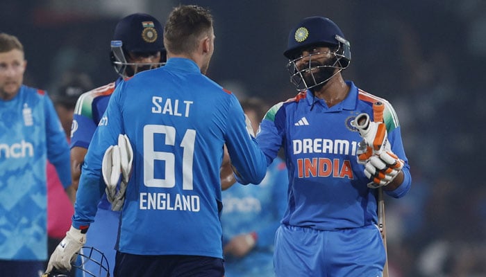 Englands Phil Salt (left) shakes hands with Ravindra Jadeja after India win second ODI by 4 wickets at Barabati Stadium, India on February 9, 2025. — Reuters