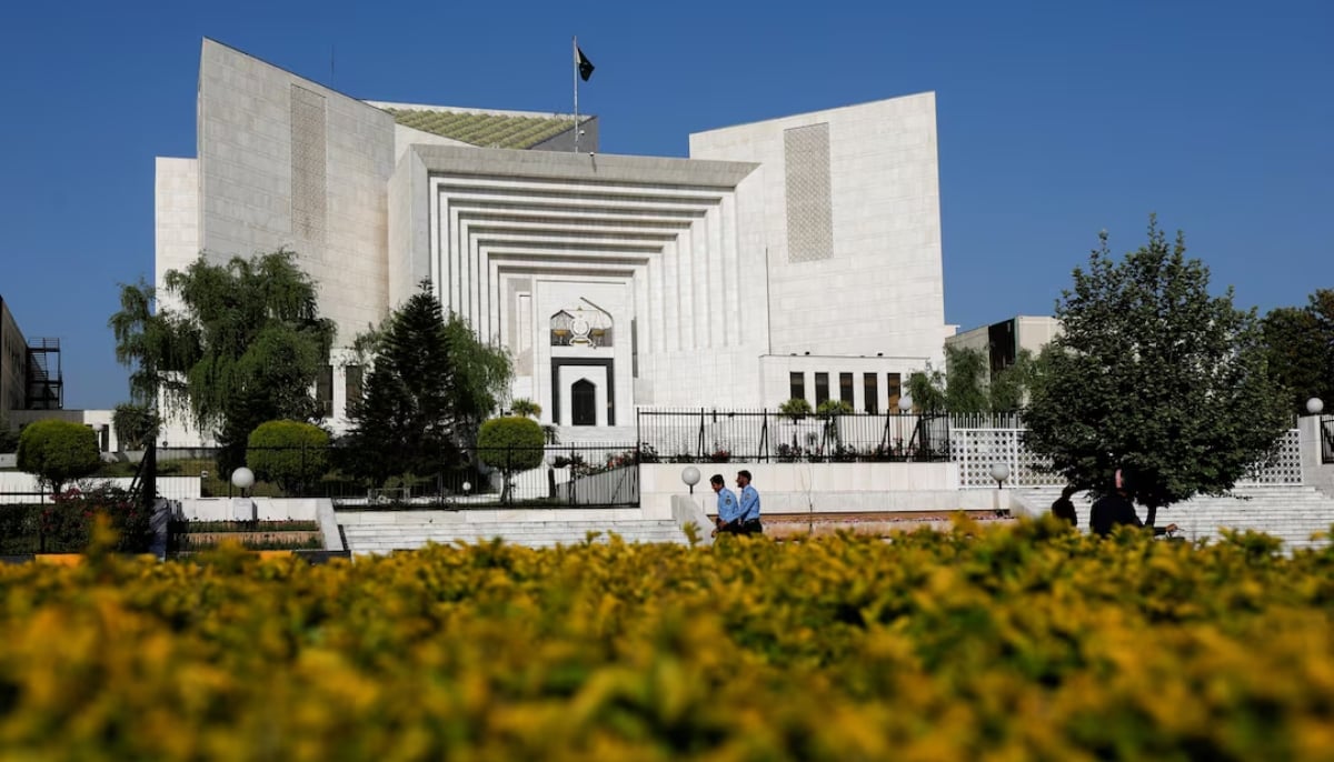 Police officers walk past the Supreme Court of Pakistan building, in Islamabad, Pakistan April 6, 2022. — Reuters