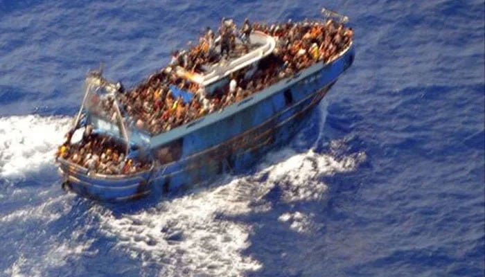 A representational image provided by the Hellenic Coast Guard shows migrants onboard a boat during a rescue operation, before their boat capsized on the open sea off Greece, June 14, 2023. — Reuters