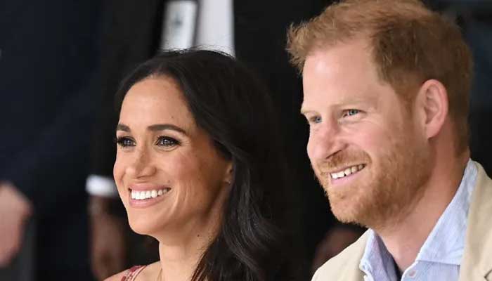 Meghan Markle uses Dolly Parton song as she and Harry walk into meeting