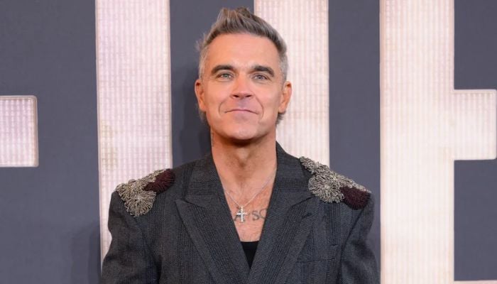 Robbie Williams’ secret struggle with his smile exposed