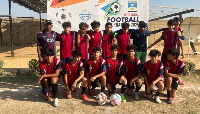 Karachi Grammar School soccer players pose for a group photo after thrashing St Lawrence on February 11, 2024. — KGS