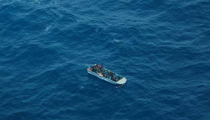 Aerial view shows a packed migrant boat en route from Libya in the central Mediterranean Sea March 11, 2023 in this handout image. — Reuters