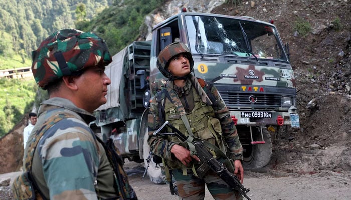 Soldiers stand next to a vehicle after an attack by freedom fighters on an Indian Army convoy in Kathua district of Jammu and Kashmir, July 9, 2024. — Reuters