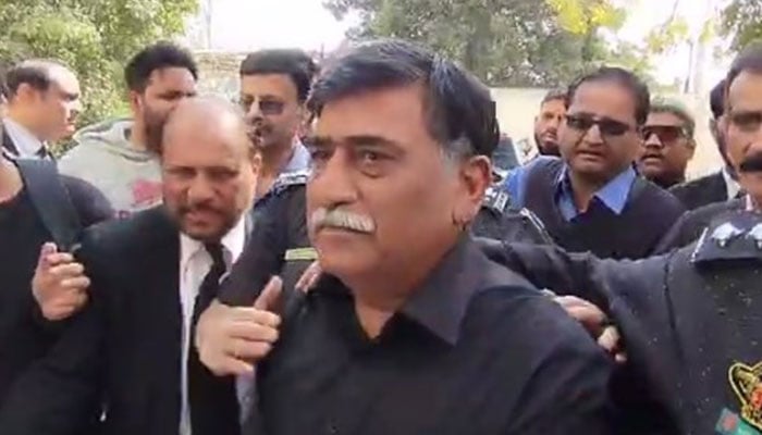 Mohajir Qaumi Movement-Haqiqi Chairman Afaq Ahmed is being escorted by police personnel during his appearance at an Anti-Terrorism Court in Karachi on February 12, 2025. — Reporter