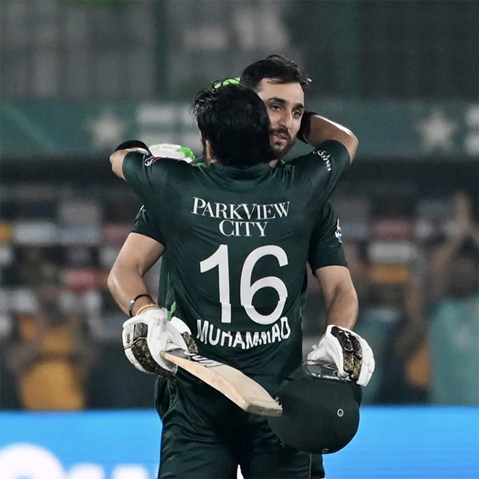 Pakistans captain Mohammad Rizwan celebrates with his teammate Salman Agha after scoring a century during the Tri-Nation series match between Pakistan and South Africa in Karachi on February 12, 2025. — Facebook/@PakistanCricketBoard