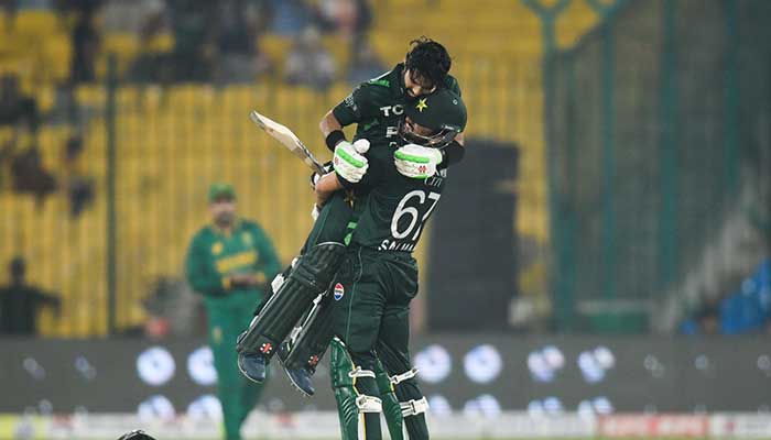 A super jubilant Salman Ali Agha hoists captain Mohammad Rizwan in pure joy as they celebrate the latter’s epic century during the tri-nation series clash against South Africa at National Stadium, Karachi, on February 12, 2025. — PCB