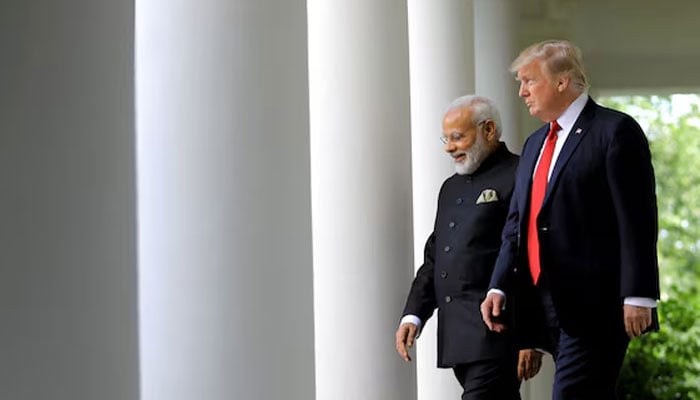 US President Donald Trump (right) arrives for a joint news conference with Indian Prime Minister Narendra Modi (left) in the Rose Garden of the White House in Washington, US, June 26, 2017. — Reuters