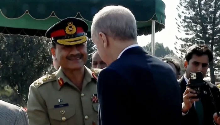 Turkish President Recep Tayyip Erdogan interacts with Chief of Army Staff General Asim Munir at the PM House in Islamabad, on February 13, 2025. — Geo News