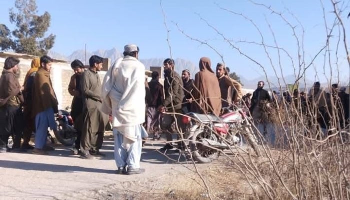 People gathered at site of bomb blast in Harnai, Balochistan, on February 14, 2025. — Reporter