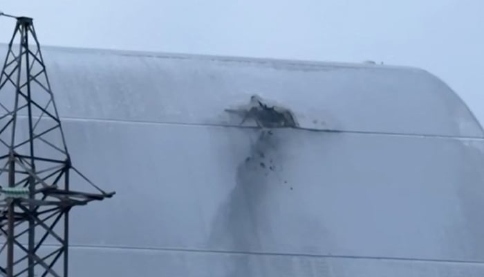 This handout photograph taken and released by Ukrainian Emergency Service on February 14, 2025 shows the New Safe Confinement (NSC), which protects the remains of reactor 4 of the former Chernobyl Nuclear Power Plant following a drone attack on its cover built to contain radiation. — AFP