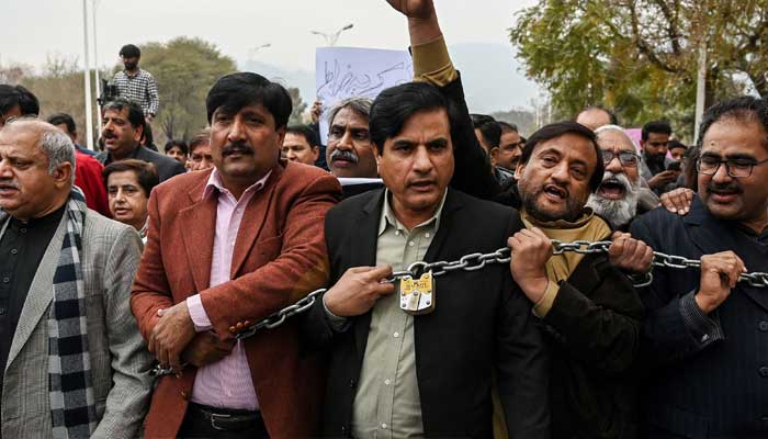 Members of the Pakistan Federal Union of Journalists shout slogans during a protest against amendments in the Prevention of Electronic Crimes Act (PECA) in Islamabad on January 28, 2025. — AFP