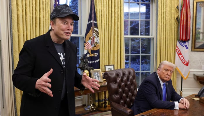 Elon Musk speaks next to U.S. President Donald Trump in the Oval Office of the White House in Washington, D.C., U.S., February 11, 2025. — Reuters