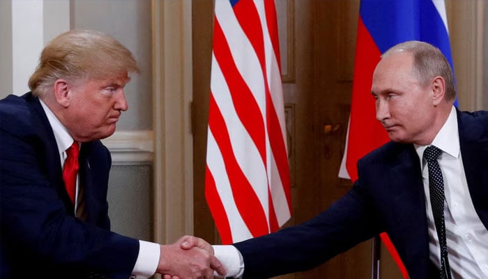 US President Donald Trump and Russian President Vladimir Putin shake hands as they meet in Helsinki, Finland, July 16, 2018. — Reuters