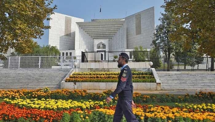 A policeman walks past the Supreme Court building in Islamabad in this undated photo — AFP/File