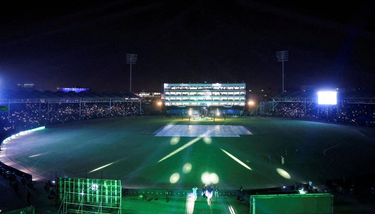 People flash lights from their mobile phones during the inauguration of the National Bank Stadium after the completion of renovation works ahead of the ICC Champions Trophy 2025 tournament in Karachi on February 11, 2025. — Reuters