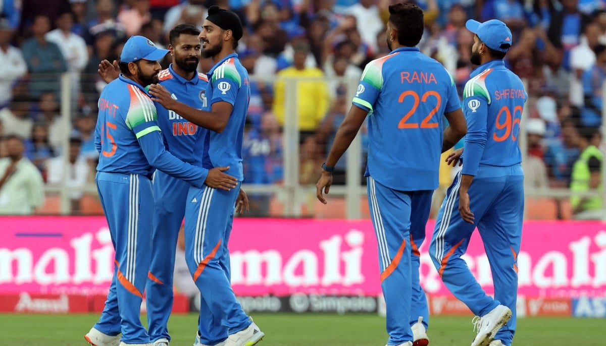 India captain Rohit Sharma and bowler Arshdeep Singh celebrate with Hardik Pandya after taking the wicket of Englands Ben Duckett during the second ODI between India and England at the Narendra Modi Stadium in Ahmedabad, India, on February 12, 2025. — Reuters