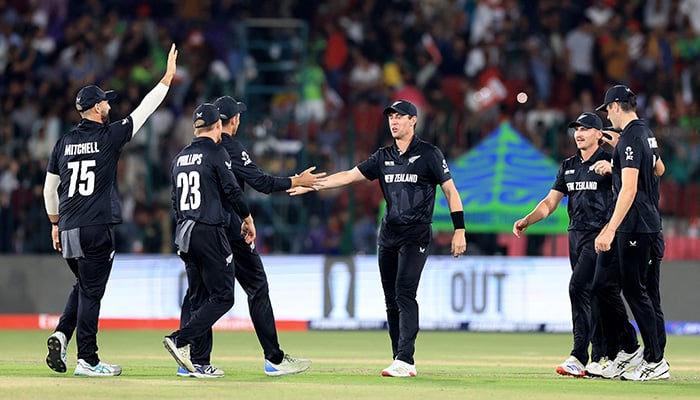 New Zealand players celebrate after Kane Williamson takes the catch to dismiss Pakistans Babar Azam, off the bowling of Mitchell Santner. — Reuters