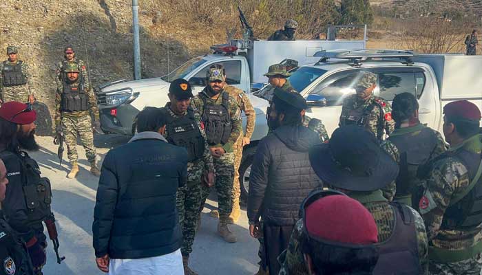 Frontier Constabulary and army personnel gather near the ambushed region in Kurram, northwest Pakistan on January 17, 2025. — AFP