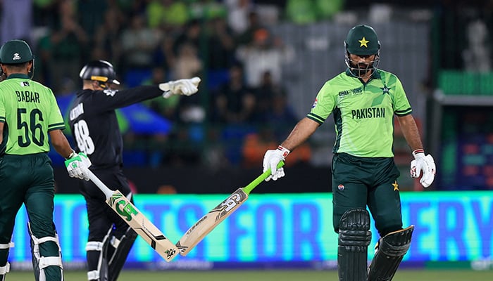 Pakistans Babar Azam and Fakhar Zaman during the opening match of Champions Trophy 2025 against New Zealand in Karachi on February 19, 2025. — Reuters