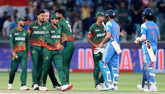 Indias Shubman Gill and KL Rahul shakes hands with Bangladesh players after winning the match. — Reuters