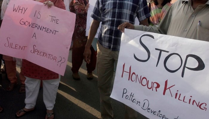 Human rights activists in Islamabad stage a rally against honour killings. — Reuters/File