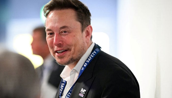 Tesla, X (formerly known as Twitter) and SpaceXs CEO Elon Musk speaks with other delegates on Day 1 of the AI Safety Summit at Bletchley Park in Bletchley, UK, November. 1, 2023. — Reuters