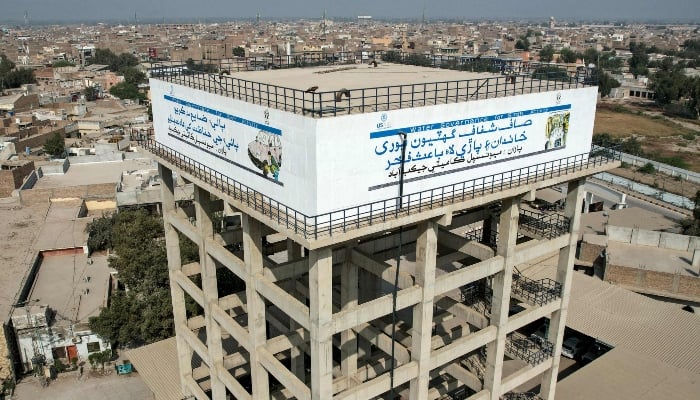 An aerial view shows a tank of the USAID-funded non-profit HANDS water supply plant, built at a residential neighbourhood in Jacobabad on February 18, 2025. — AFP