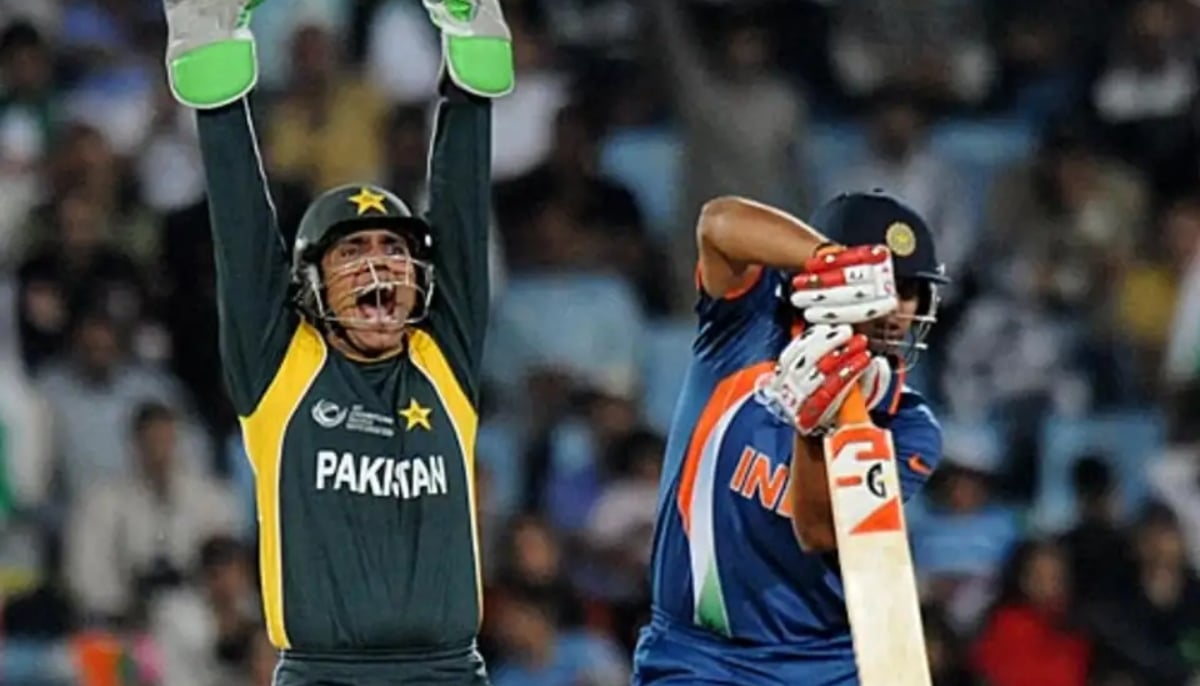 Former Pakistan wicketkeeper Kamran Akmal reacts in a match with India. — AFP/File