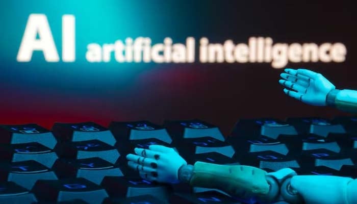 A message reading AI artificial intelligence, a keyboard, and robot hands are seen in this illustration taken January 27, 2025. — Reuters