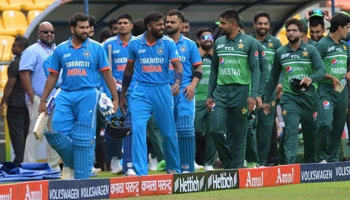 India´s (left) and Pakistan´s players arrive for the Asia Cup 2023 ODI cricket match between India and Pakistan at the Pallekele International Cricket Stadium in Kandy on September 2, 2023. — AFP