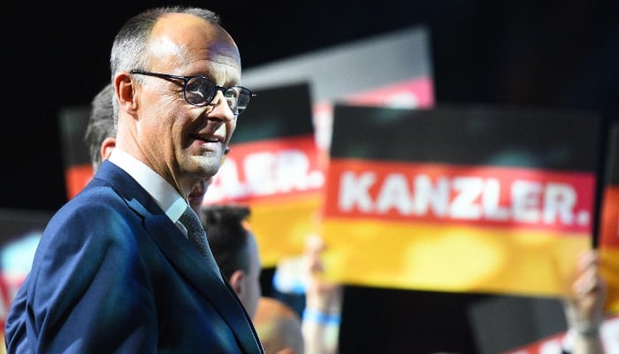 Friedrich Merz, Leader of conservative Christian Democratic Union (CDU) and main candidate is pictured during the last electoral rally in the Rudolf Weber-Arena in Oberhausen, western Germany, on February 21, 2025. — AFP