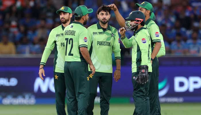 Pakistans Abrar Ahmed celebrates with teammates after taking the wicket of Indias Shubman Gill at Dubai International Stadium, Dubai, United Arab Emirates - February 23, 2025. — Reuters