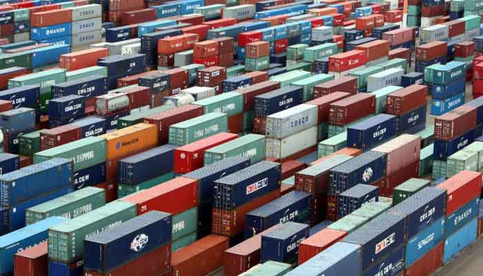 The image shows containers at a harbour. — Reuters/File