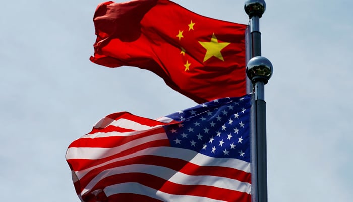 Chinese and US flags flutter. — Reuters/File