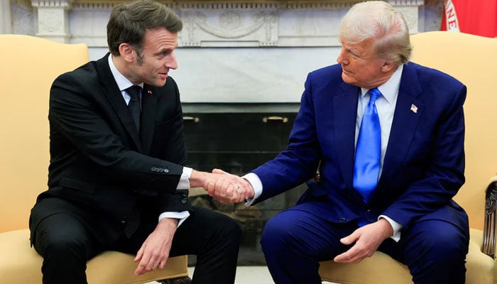 US President Donald Trump shakes hands with French President Emmanuel Macron at the White House in Washington, DC, US, February 24, 2025. — Reuters