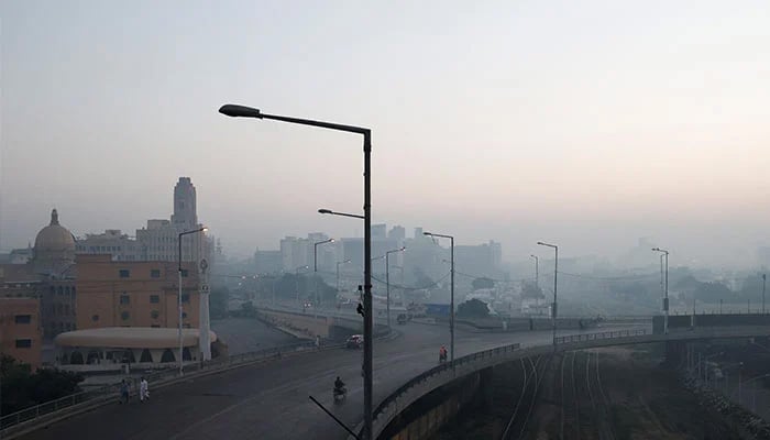 An aerial view of Karachi showing the Native Jetty bridge and the Karachi Port Trust building on a smoggy morning in the metropolis. — Reuters