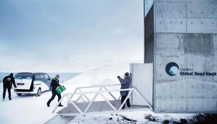 A person carries a box while entering the Svalbard Global Seed Vault in the Arctic. — AFP/File