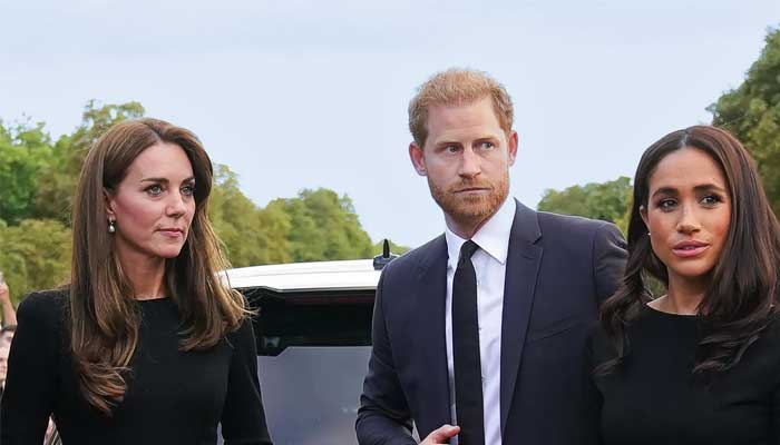 Kate Middleton, Prince Harry and Meghan Markle pictured together at an event